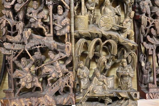Ten Chinese carved giltwood panels of court scenes and immortals